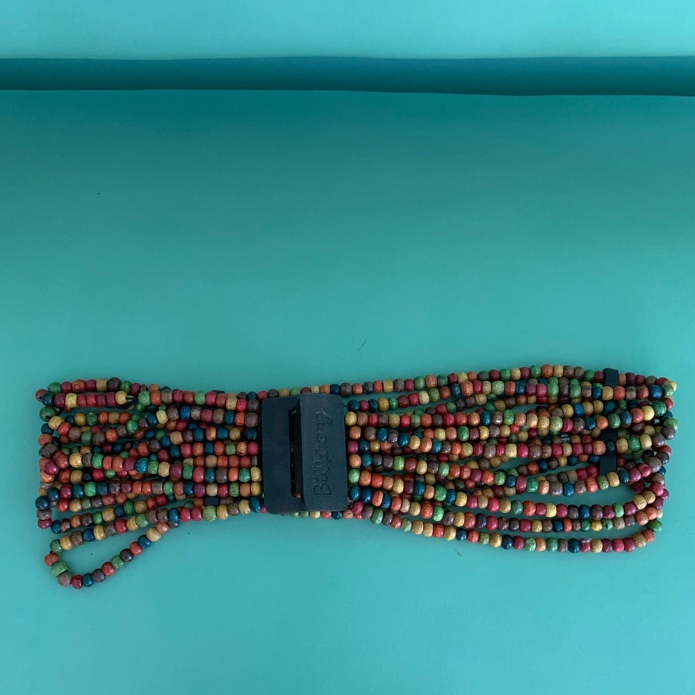 Women’s billabong wooden rainbow beaded belt.